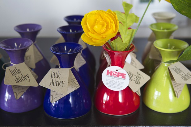 Little Shirley vases are displayed at USA Boutiques, 9500 S. Eastern Ave., Monday, March 25, 2013. The store sells only made-in-the-USA products.