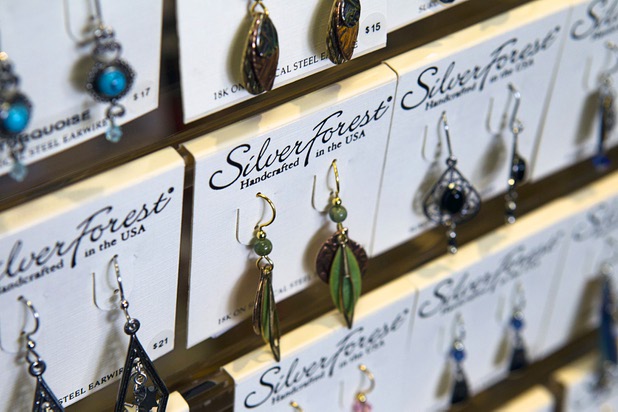 Silver Forest earrings are displayed at USA Boutiques, 9500 S. Eastern Ave., Monday, March 25, 2013. The store sells only made-in-the-USA products.
