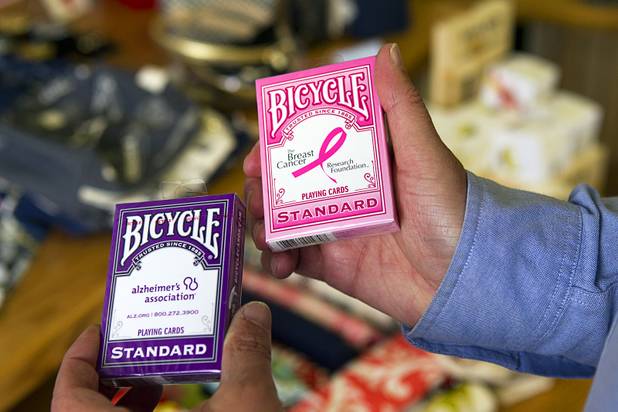 Richard Naft displays Bicycle playing cards at USA Boutiques, 9500 S. Eastern Ave., Monday, March 25, 2013. The store sells only made-in-the-USA products.