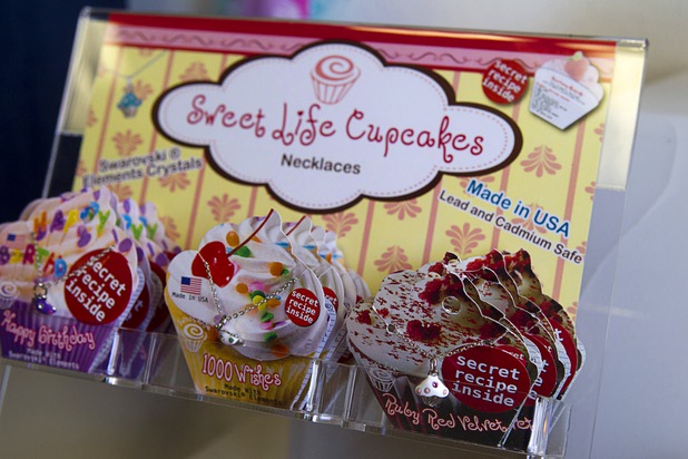 Sweet Life Cupcake necklaces are displayed at USA Boutiques, 9500 S. Eastern Ave., Monday, March 25, 2013. The store sells only made-in-the-USA products.