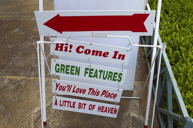 Signs are shown outside USA Boutiques, 9500 S. Eastern Ave., Monday, March 25, 2013. The store sells only made-in-the-USA products.
