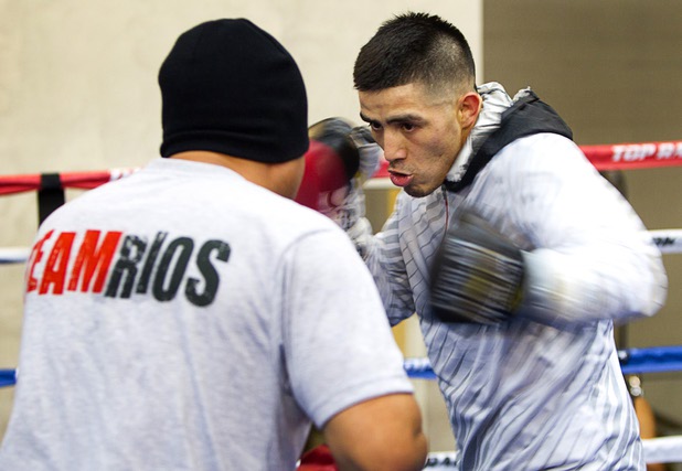 Light welterweight boxer Brandon Rios works on his timing with trainer Robert Garcia at Top Rank Gym Wednesday, March 27, 2013. Rios will face Mike Alvarado for a rematch at the Mandalay Bay Saturday.