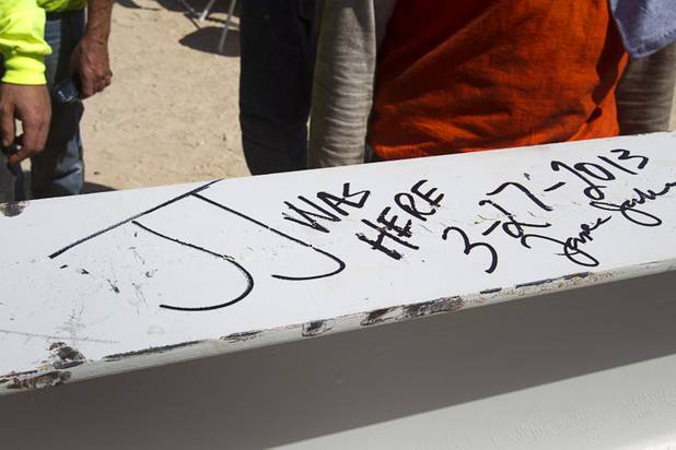 The final beam is shown during a topping-out ceremony for the Federal Justice Tower in downtown Las Vegas Wednesday, March 27, 2013. The new 11-story tower, just to the south of the Lloyd D. George Federal Courthouse on Las Vegas Boulevard, will house the executive and administrative offices of the Department of Homeland Security, U.S. Immigration, U.S. Attorney's Office for the District of Nevada, the Department of Labor Office of Inspector General and the Federal Protective Services.