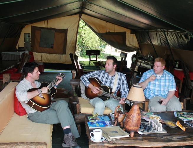 Frankie, Tony and Ricky Moreno work out a new song in the main tent at Porini Mara Camp in southeast Kenya.