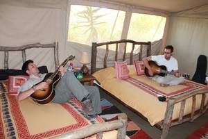 Frankie and Tony Moreno work out the chorus for "Hello World" in their tent at Porini Mara Camp in Ol Kinyei Conservancy in southeastern Kenya.