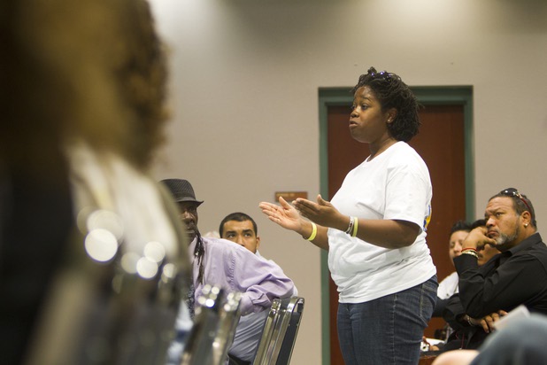 U.S. Army veteran Vita Lopez asks a question to Congressman Steven Horsford (D-NV) during a town hall meeting at the Cora Coleman Senior Center in Las Vegas Thursday, March 28, 2013. Horsford will have a meet and greet at 7222 W. Grand Teton Ave. on Saturday.