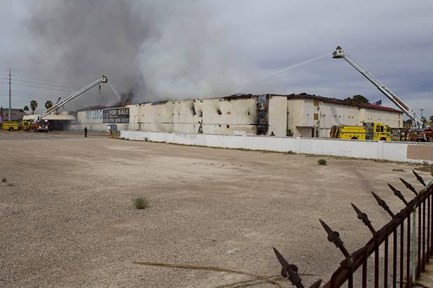 Clark County and City of Las Vegas firefighters battle a four-alarm fire at the old Key Largo Casino on Flamingo Avenue and Paradise Road Thursday, March 28, 2013.