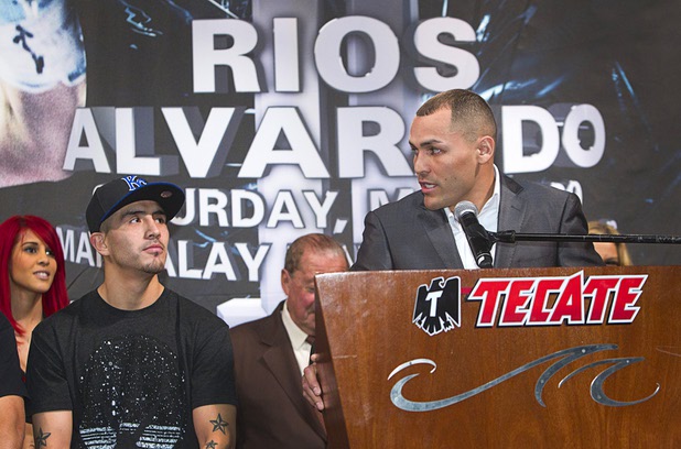 Light welterweight boxers Brandon Rios, left, listens to Mike Alvarado during a final news conference at the Mandalay Bay Thursday, March 28, 2013. The boxers meet for a rematch at the Mandalay Bay Events Center Saturday.