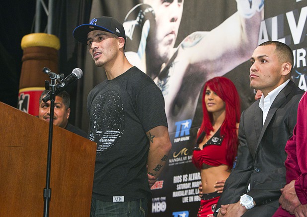 Light welterweight boxer Brandon Rios, left, speaks as Mike Alvarado listens at right during a final news conference, at the Mandalay Bay Thursday, March 28, 2013. The boxers meet for a rematch at the Mandalay Bay Events Center Saturday.