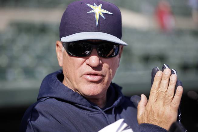 Tampa Bay Rays manager Joe Maddon addresses the media before an exhibition spring training baseball game against the Baltimore Orioles, Thursday, March 28, 2013, in Sarasota, Fla.