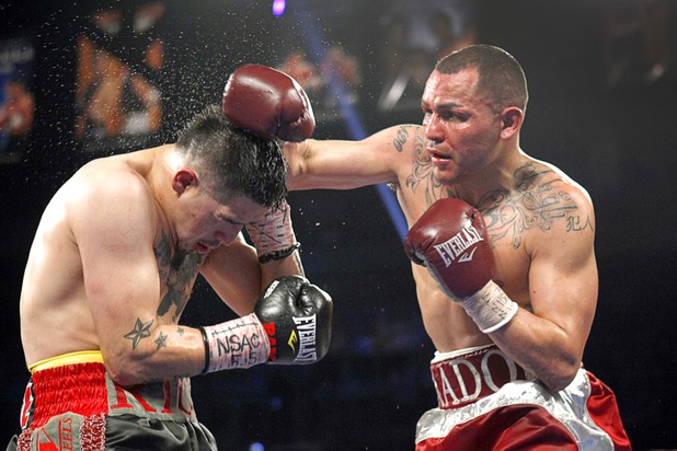 Brandon Rios, left, battles with Mike Alvarado during a super lightweight bout for an interim 140lb. WBO title at the Mandalay Bay Events Center Saturday, March 30, 2013. Alvarado won the fight by unanimous decision. The fight was a rematch to a Oct. 13, 2012 fight  which Rios won.