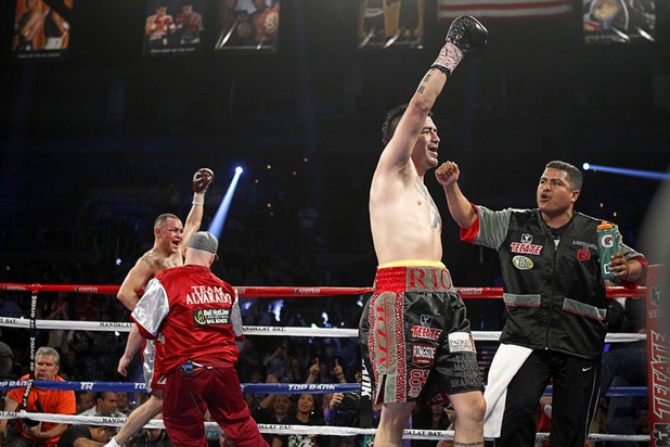 Mike Alvarado, left, and Brandon Rios both celebrate following a 12-round super lightweight bout for an interim 140lb. WBO title at the Mandalay Bay Events Center Saturday, March 30, 2013. Alvarado was later declared the winner by a unanimous decision. The fight was a rematch to a Oct. 13, 2012 fight  which Rios won.
