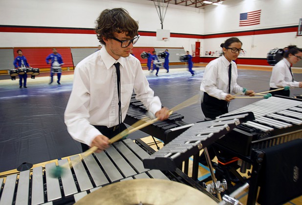 Zac Allen, left, and Belle Martinez practice with Vegas Vanguard, a competitive percussion ensemble, at UNLV Sunday, March 31, 2013. The group will be competing in the WGI Percussion World Championships in Dayton, Ohio on April 18th.