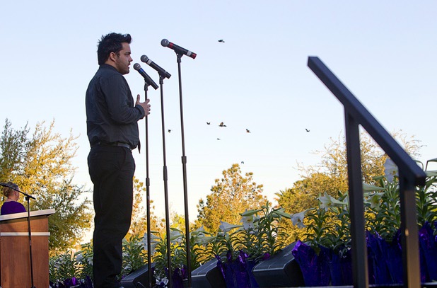 Casey Moore sings "Bring Him Home" during the 28th annual Easter sunrise service at Palm Eastern Mortuary and Cemetery Sunday, March 31, 2013.