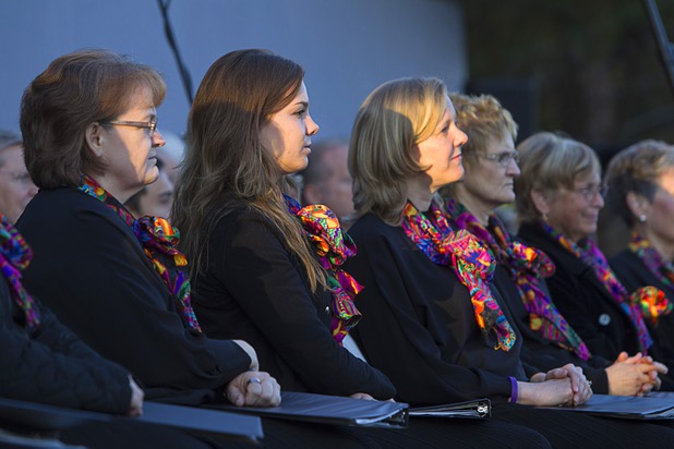 The morning light shines on members of Desert Chorale during the 28th annual Easter sunrise service at Palm Eastern Mortuary and Cemetery Sunday, March 31, 2013.