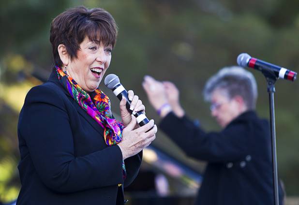 April Taggart performs with the Desert Chorale during the 28th annual Easter sunrise service at Palm Eastern Mortuary and Cemetery Sunday, March 31, 2013.