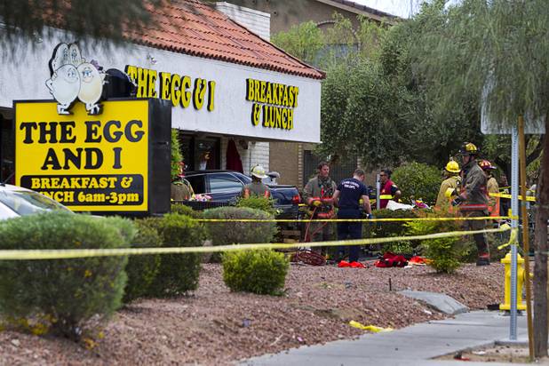 Firefighters pack up their gear after making rescues at the Egg and I restaurant on West Sahara Avenue Monday April 1, 2013. As many as 10 people were injured when a Lexus sedan left the roadway and crashed into the restaurant.