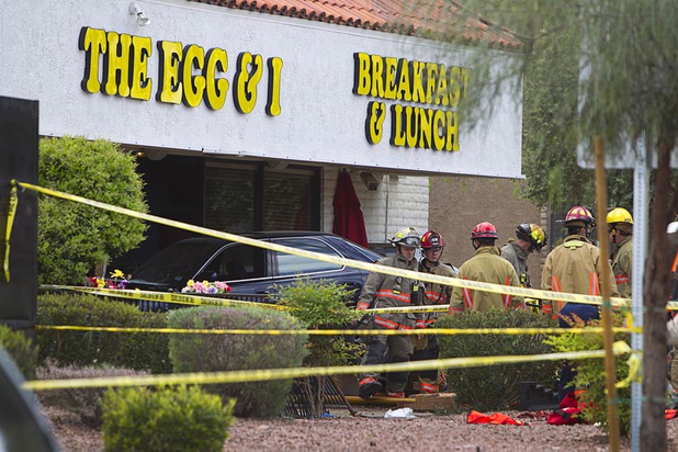 Firefighters pack up their gear after making rescues at the Egg and I restaurant on West Sahara Avenue Monday April 1, 2013. As many as 10 people were injured when a Lexus sedan left the roadway and crashed into the restaurant.