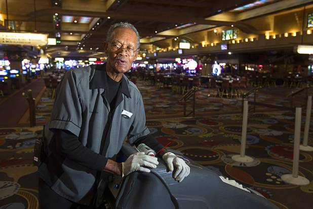 Henry Moore, a carpet shampoo porter, known for whistling and singing as he works during the graveyard shift, demonstrates a whistle at the Excalibur Monday, April 1, 2013. Hes been entertaining guests in the dead of night for almost a quarter century.