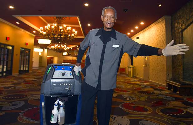 Henry Moore, a carpet shampoo porter, known for whistling and singing as he works during the graveyard shift, sings at the Excalibur Monday, April 1, 2013. Hes been entertaining guests in the dead of night for almost a quarter century.