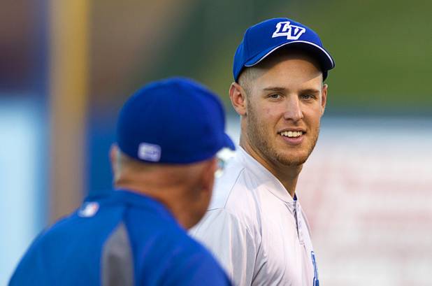 Pitcher Zack Wheeler talks with a coach during Las Vegas 51s practice at Cashman Field Tuesday, April 2, 2013. The 51s open the season Thursday against the RiverCats at Sacramento. This is the first year the 51s are affiliated with the Mets.