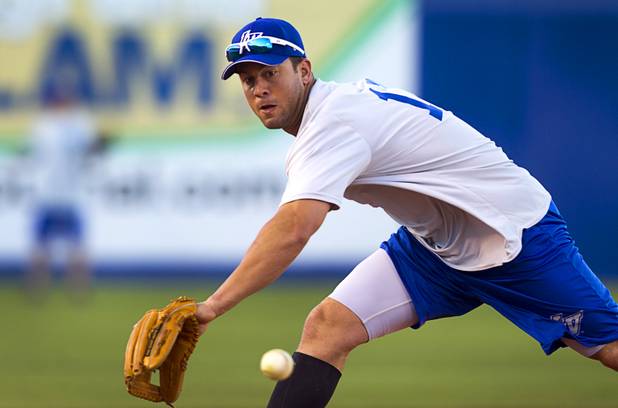Shortstop Brandon Hicks fields a ball during Las Vegas 51s practice at Cashman Field Tuesday, April 2, 2013. The 51s open the season Thursday against the RiverCats at Sacramento. This is the first year the 51s are affiliated with the Mets.