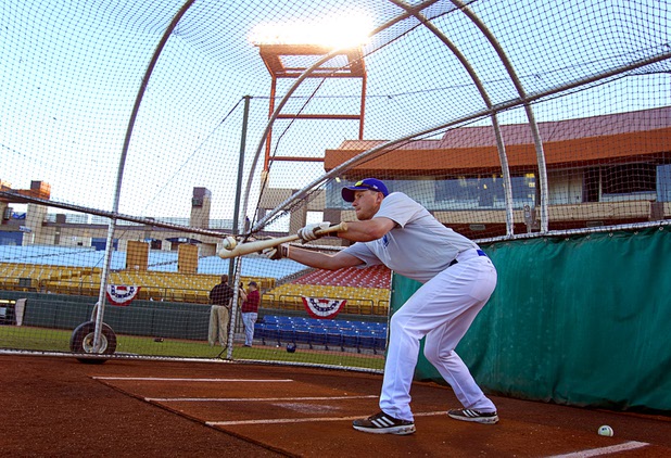 Las Vegas 51s catcher Kai Gronauer bunts during batting practice at Cashman Field Tuesday, April 2, 2013. The 51s open the season Thursday against the RiverCats at Sacramento. This is the first year the 51s are affiliated with the Mets.