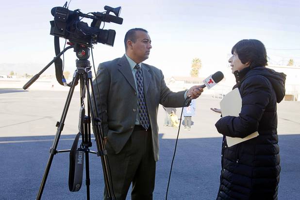 Telemundo journalist Abel Ortiz interviews a teacher during Education Awareness Day at Fay Herron Elementary School in North Las Vegas Feb. 25, 2013. 