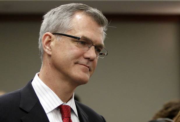 Steven Jacobs, former Las Vegas Sands China CEO, is shown during a courtroom break at the Regional Justice Center Thursday, April 4, 2013. Hong Kong businessman Richard Suen is suing the Las Vegas Sands saying he is owed millions of dollars in an agreement in which he helped Sands secure its gaming license in Macau a decade ago.
