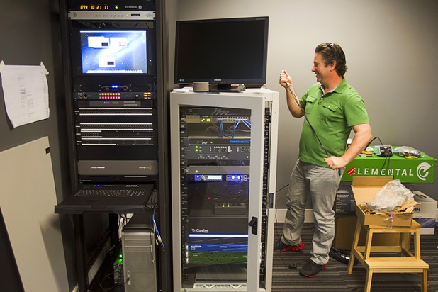 Lowell Kay, a technology consultant, installs media production equipment at the fremont east studios in downtown Las Vegas Thursday, April 4, 2013. The video and audio studios are scheduled to hold a grand opening on April 9.