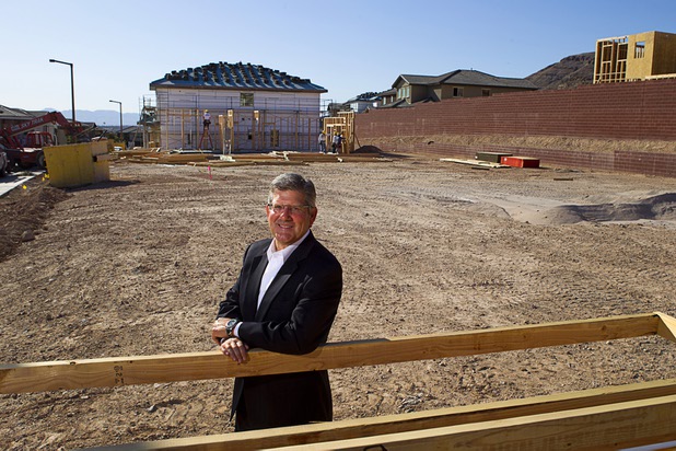 Laus Abdo, president AGP Capital and TriArchic Advisors, poses at a residential construction site in the west side of the Las Vegas Valley in Las Vegas, April 5, 2013.