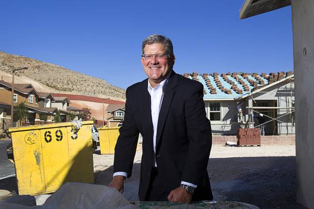 Laus Abdo, president AGP Capital and TriArchic Advisors, poses at a residential construction site in the west side of the Las Vegas Valley in Las Vegas, April 5, 2013.