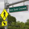 A sign hangs over a new crosswalk on North Decatur Boulevard between Vegas Drive and Lake Mead Boulevard Monday, April 8, 2013. The crosswalk is dedicated to Doris Stoehr, a resident of Las Vegas Manor senior complex, who was killed crossing the boulevard in February.