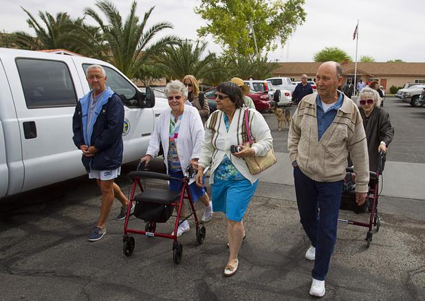 Las Vegas Manor residents come out to try out a new crosswalk on North Decatur Boulevard Monday, April 8, 2013. The crosswalk is dedicated to Doris Stoehr, a resident of the senior complex, who was killed crossing the boulevard in February.