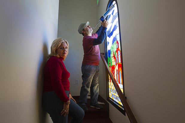 Artist Yamile Gaez stands by as Armando Fragoza installs one of her stained glass windows at St. Garabed Armenian Apostolic Church of Las Vegas on East Desert Inn Road Tuesday, April 9, 2013. The church is nearing completion and is scheduled to be consecrated this weekend by Western Prelate Archbishop Moushegh Mardirossian.