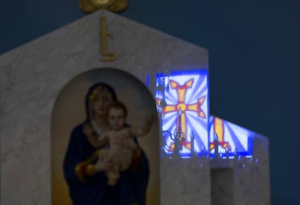 An Armenian cross from a stained glass window is reflection on the altar at St. Garabed Armenian Apostolic Church of Las Vegas on East Desert Inn Road Tuesday, April 9, 2013. The church is nearing completion and is scheduled to be consecrated this weekend by Western Prelate Archbishop Moushegh Mardirossian.