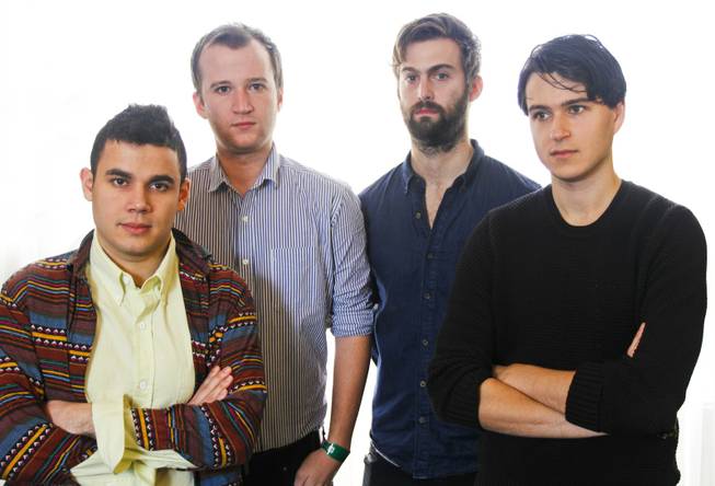 Vampire Weekend's Ezra Koenig, Chris Thomson, Chris Baio, and Rostam Batmanglij, right to left, pose for a photograph during the SXSW Music Festival, on Thursday, March 14, 2013 in Austin, Texas.