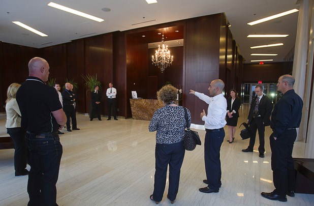 Christian Petrou, CEO and founder of Rvnue Technologies, points out lobby security cameras during a hi-tech security tour of the Panorama Towers Wednesday, April 10, 2013. The tour was held in conjunction with the International Security Conference & Exposition (ISC West)  taking place at the Sands Expo Center.