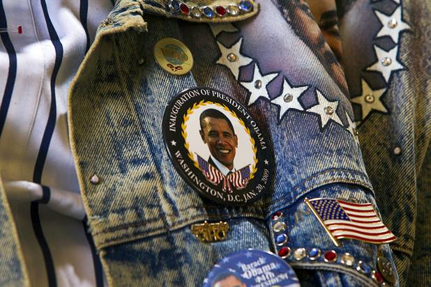 A button shows support for President Barack Obama on his custom-made jacket during an exclusive interview with boxing promoter Don "Only in America" King at a Treasure Island penthouse Thursday, April 11, 2013.