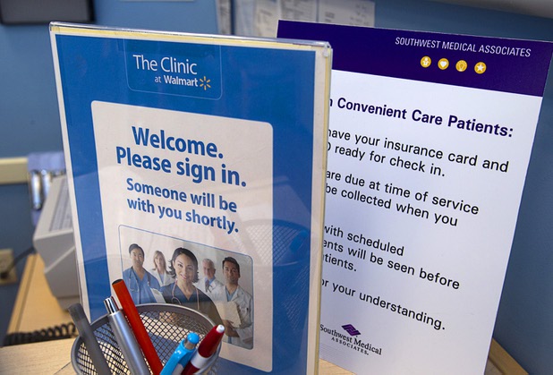 A welcome sign is shown at the check-in desk at a Southwest Medical Associates clinic inside a Walmart, 300 E. Lake Mead Pkwy., in Henderson Thursday, April 11, 2013.