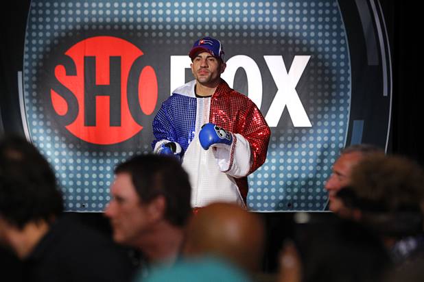 Angelo "La Cobra" Santana of Cuba prepares to make his ring entrance for a WBA lightweight bout against Bahodir "Baha" Mamadjonov of Uzbekistan at the Treasure Island Friday, April 12, 2013.