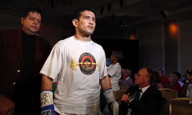 Bahodir "Baha" Mamadjonov of Uzbekistan makes his way to the ring for a WBA lightweight bout against Angelo "La Cobra" Santana of Cuba at the Treasure Island Friday, April 12, 2013.
