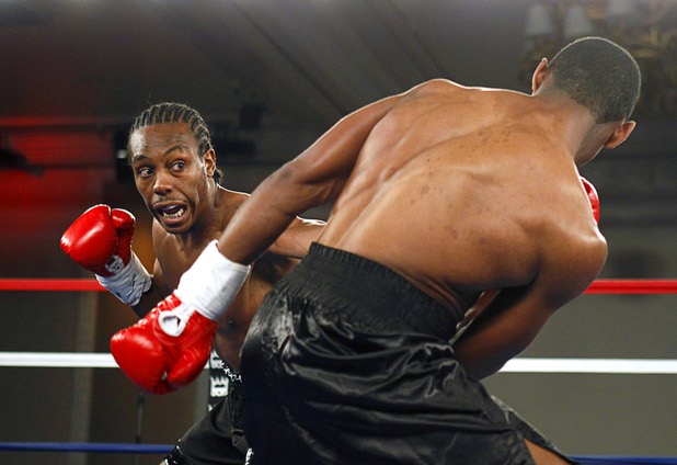 Amir "Little Master" Imam, left, of Albany, N.Y. and Jeremy "Hollywood" Bryan of Paterson, N.J. battle during a super lightweight attraction at the Treasure Island Friday, April 12, 2013. Imam knocked out Bray in the second round.