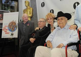 Karen Kramer, second from right, widow of director Stanley Kramer, poses with 