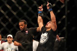 Kelvin Gastelum rejoices as he is the announced winner of a split decision over Uriah Hall to win The Ultimate Fighter 17 Finale Saturday, April 13, 2013 at the Mandalay Bay Events Center.