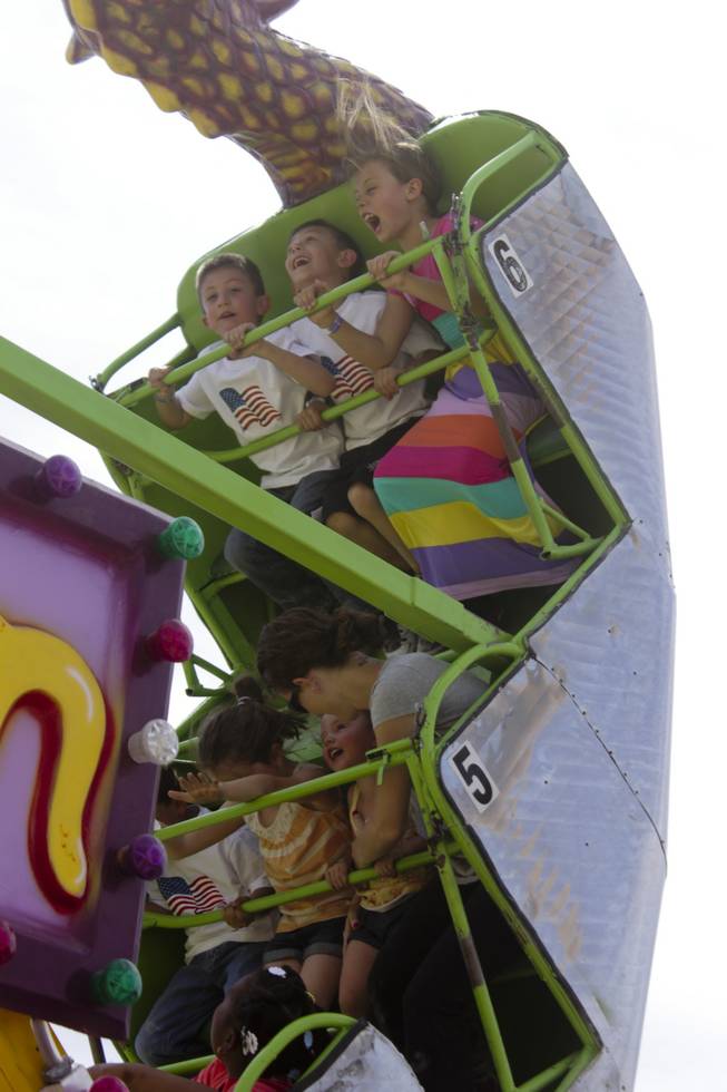 Kids enjoy a ride at the 2013 Clark County Fair, Saturday, April 13, 2013.