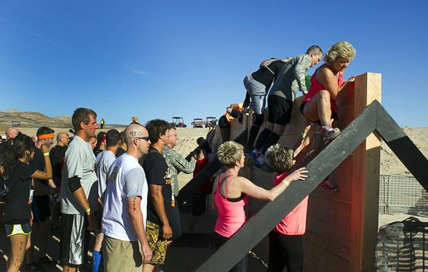 The first obstacle is making getting to the start line during the Tough Mudder in Beatty, Nev. Sunday, April 14, 2013. Tough Mudder events are hardcore 10-12 mile obstacle courses designed to test all-around strength, stamina, mental grit, and camaraderie.
