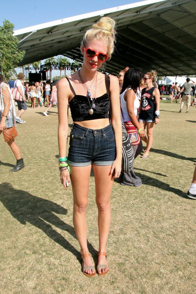 Music fans show off their festival fashions at Weekend 1 of the Coachella Valley Music and Arts Festival in Indio, Calif. April 12-14, 2013.