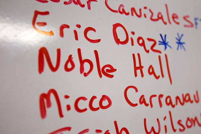 Valley High School football player Noble Hall's name is shown on a white board in coach Marcus Sherman's office at the school Monday, April 15, 2013. Hall recently changed his name from Eric Burrell to Noble Hall (his father's name) to honor his father who was killed before he was born.