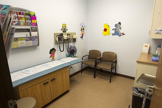 A exam room is decorated for children at the Advanced Urgent Care clinic, 9975 S. Eastern Ave., Monday, April 15, 2013.